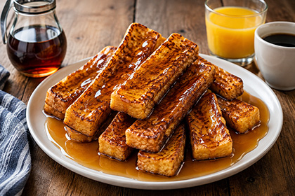 French Toast Sticks bathed in Syrup
